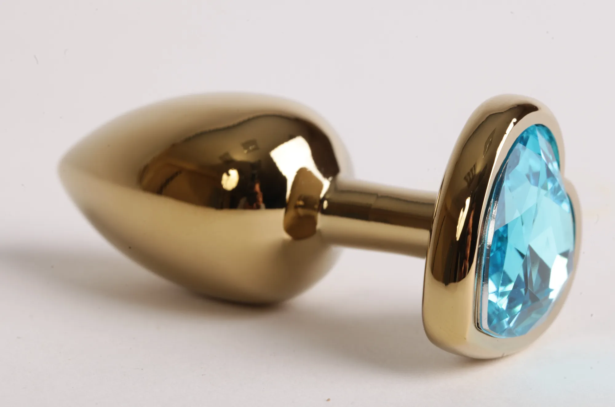 Анальная пробка золото 7,5 х 2,8 см с сердечком голубой страз размер-S 47194-MM